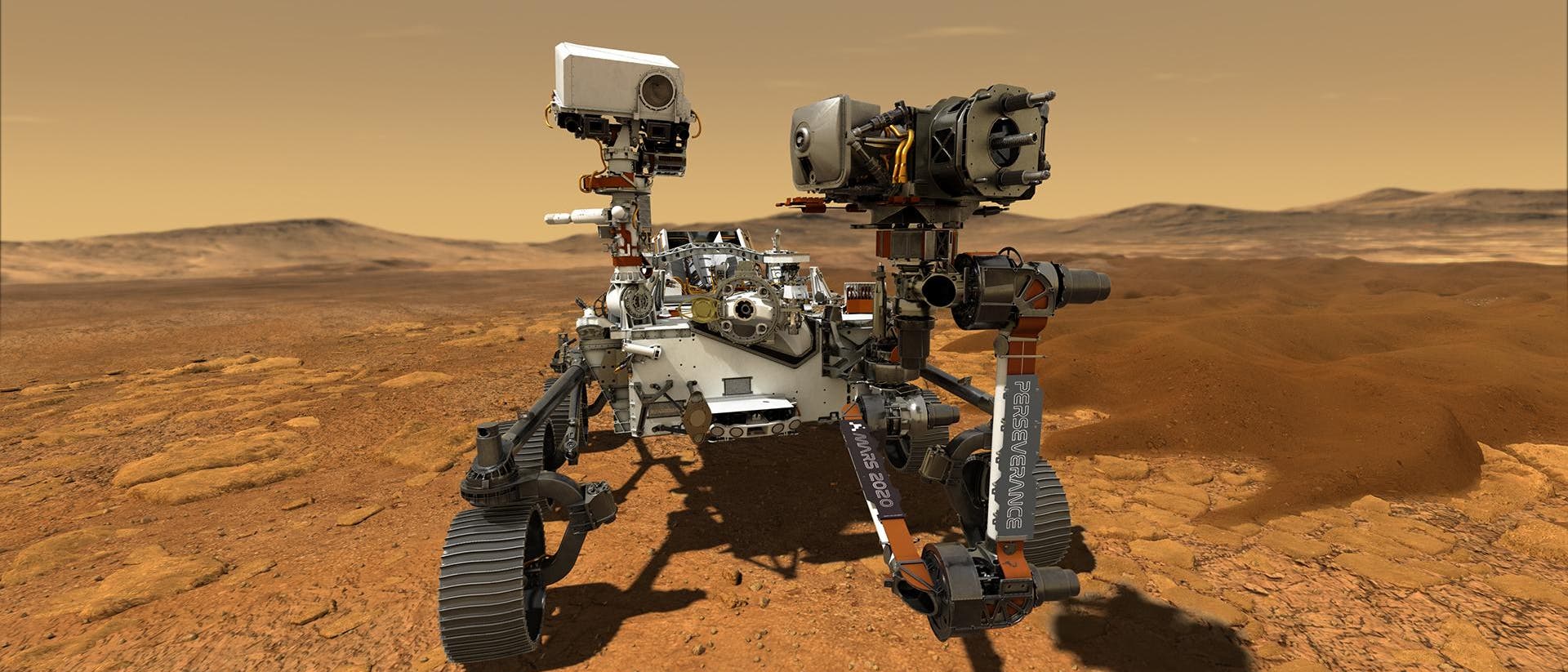 Künstlerische Darstellung des Rovers Perseverance auf dem Mars. Ein Robotergefährt in rötlicher Wüste unter orangefarbenem Himmel. Künstlerische Darstellung des Rovers Perseverance auf dem Mars. Ein Robotergefährt in rötlicher Wüste unter orangefarbenem Himmel.