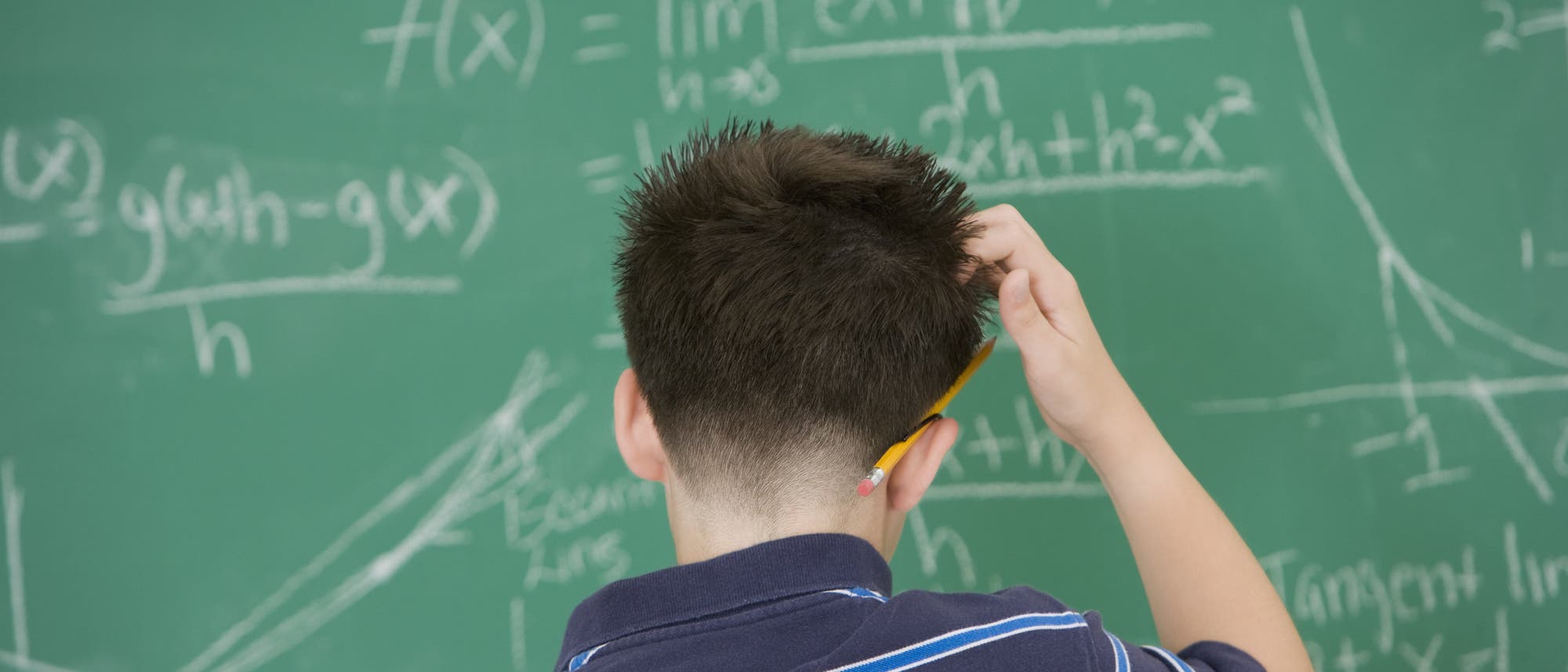 Schüler vor der Tafel Schüler vor der Tafel