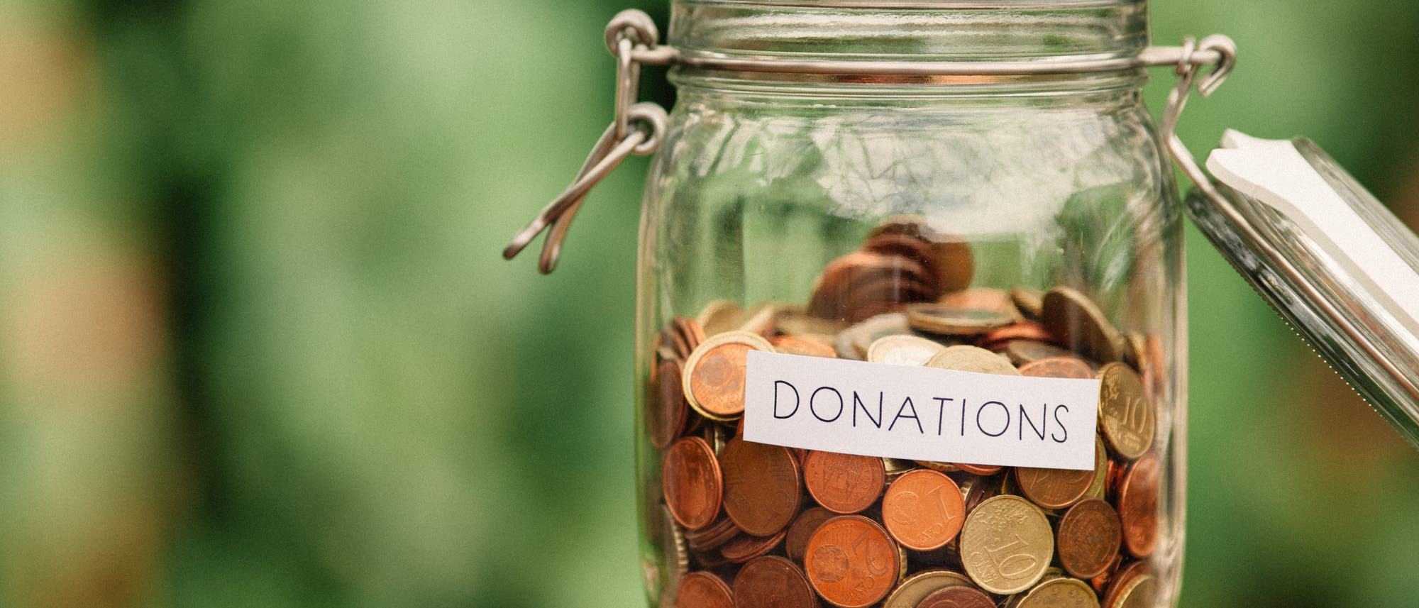 Glas mit Geld für Spenden Glas mit Geld für Spenden