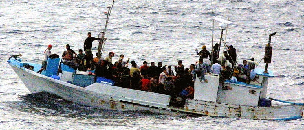 Flüchtlinge auf einem Boot Flüchtlinge auf einem Boot