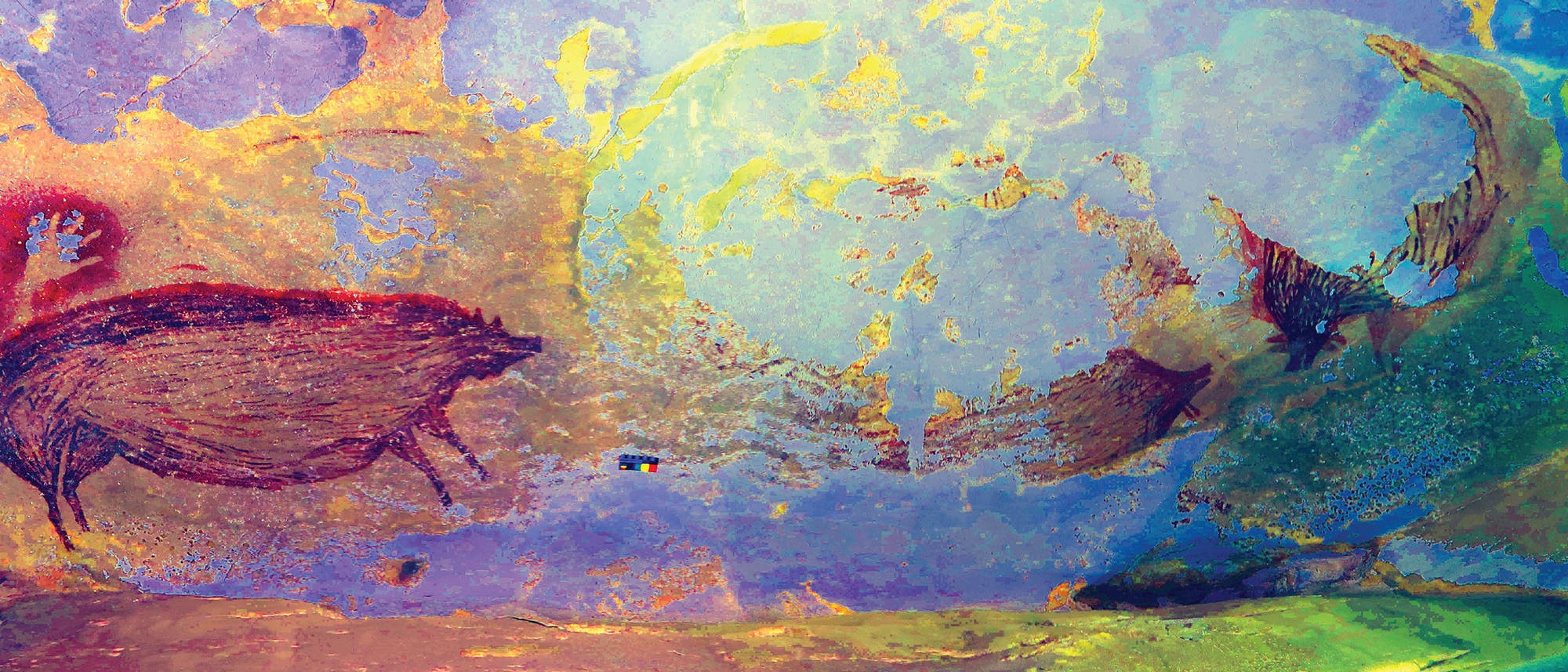 Aufnahme in Falschfarben von Pustelschweinen an einer Höhlenwand auf Sulawesi. Das Alter: 45500 Jahre. Aufnahme in Falschfarben von Pustelschweinen an einer Höhlenwand auf Sulawesi. Das Alter: 45500 Jahre.