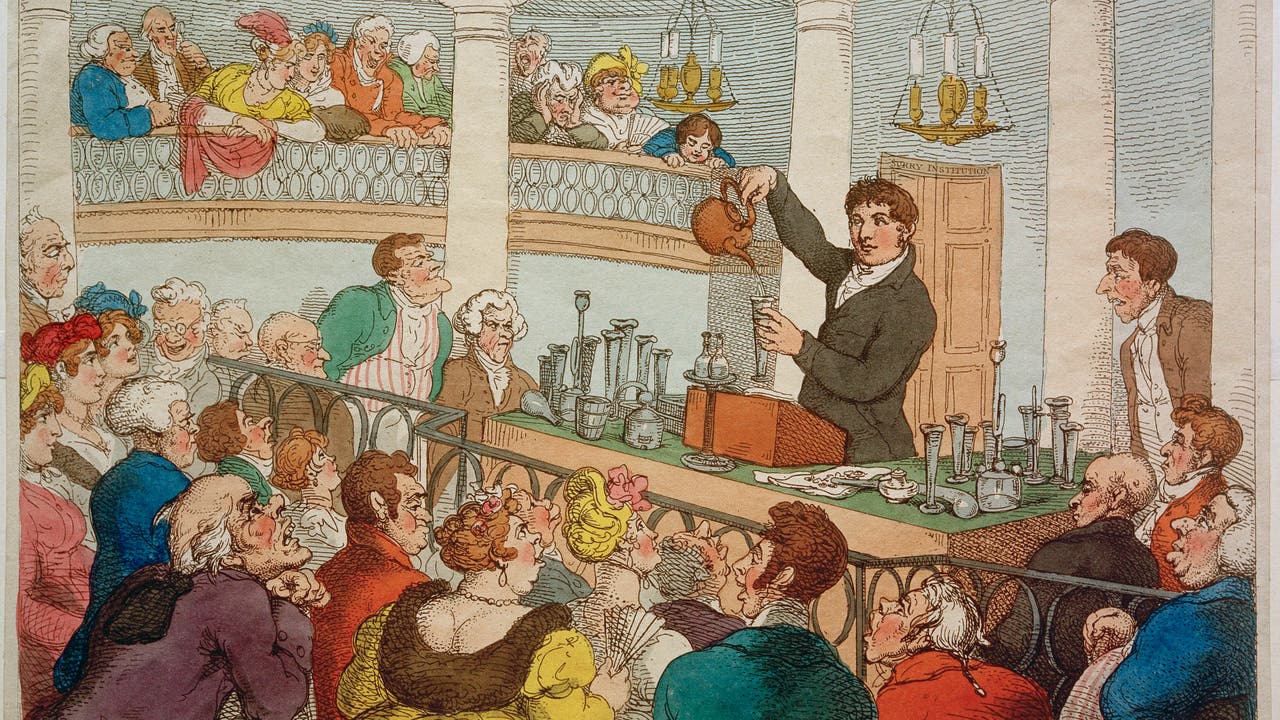 Friedrich Accum bei einer Chemie-Darbietung im Surrey Institute in London. Karikatur von Thomas Rowlandson, um 1810. 