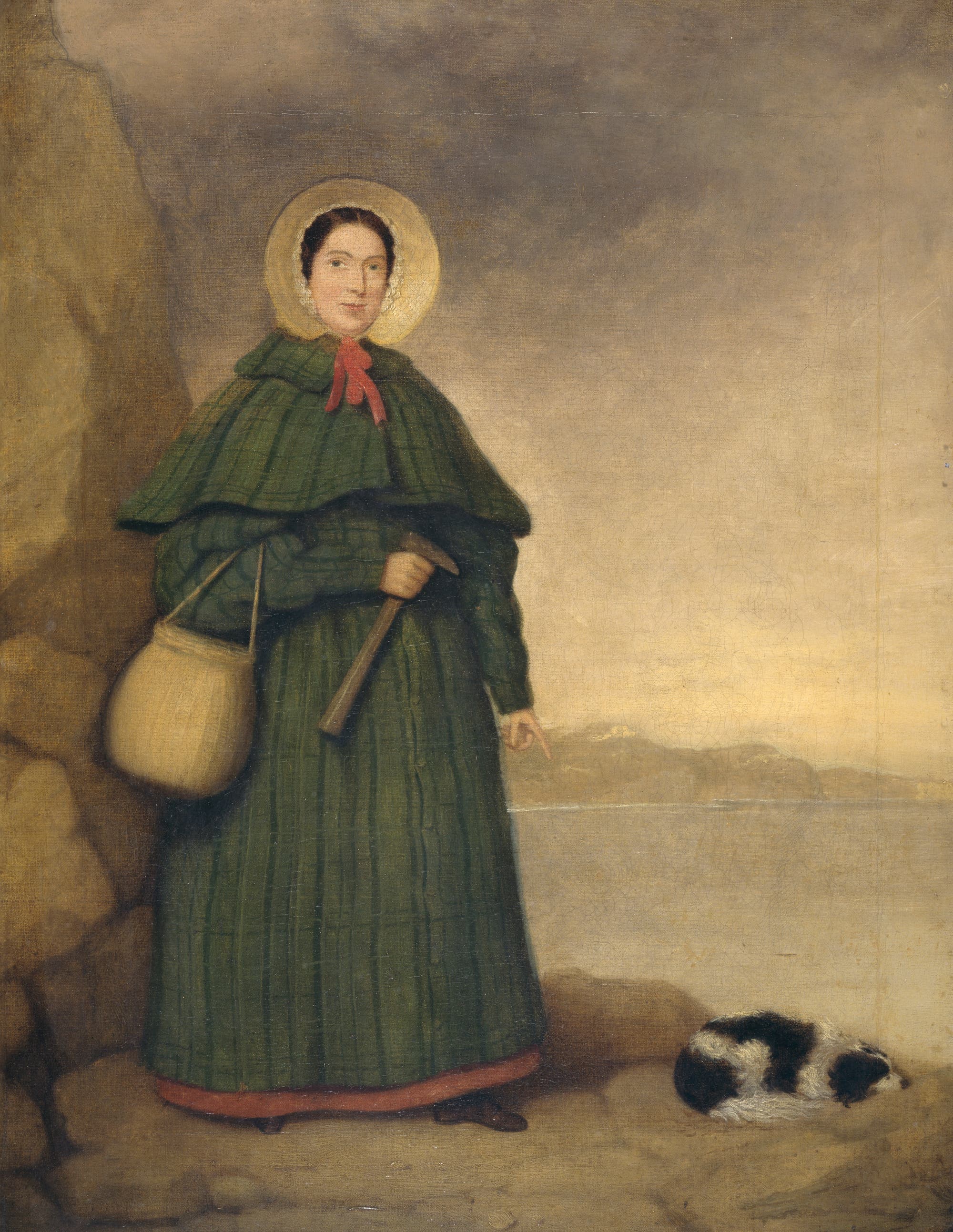 In einem Gemälde steht die Britin Mary Anning mit ihrem Hund an einer Fossilienfundstätte an der südenglischen Küste. Das Gemälde entstand vor 1842.