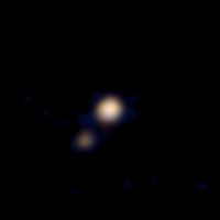 Das erste Farbbild von Pluto und Charon (New Horizons)