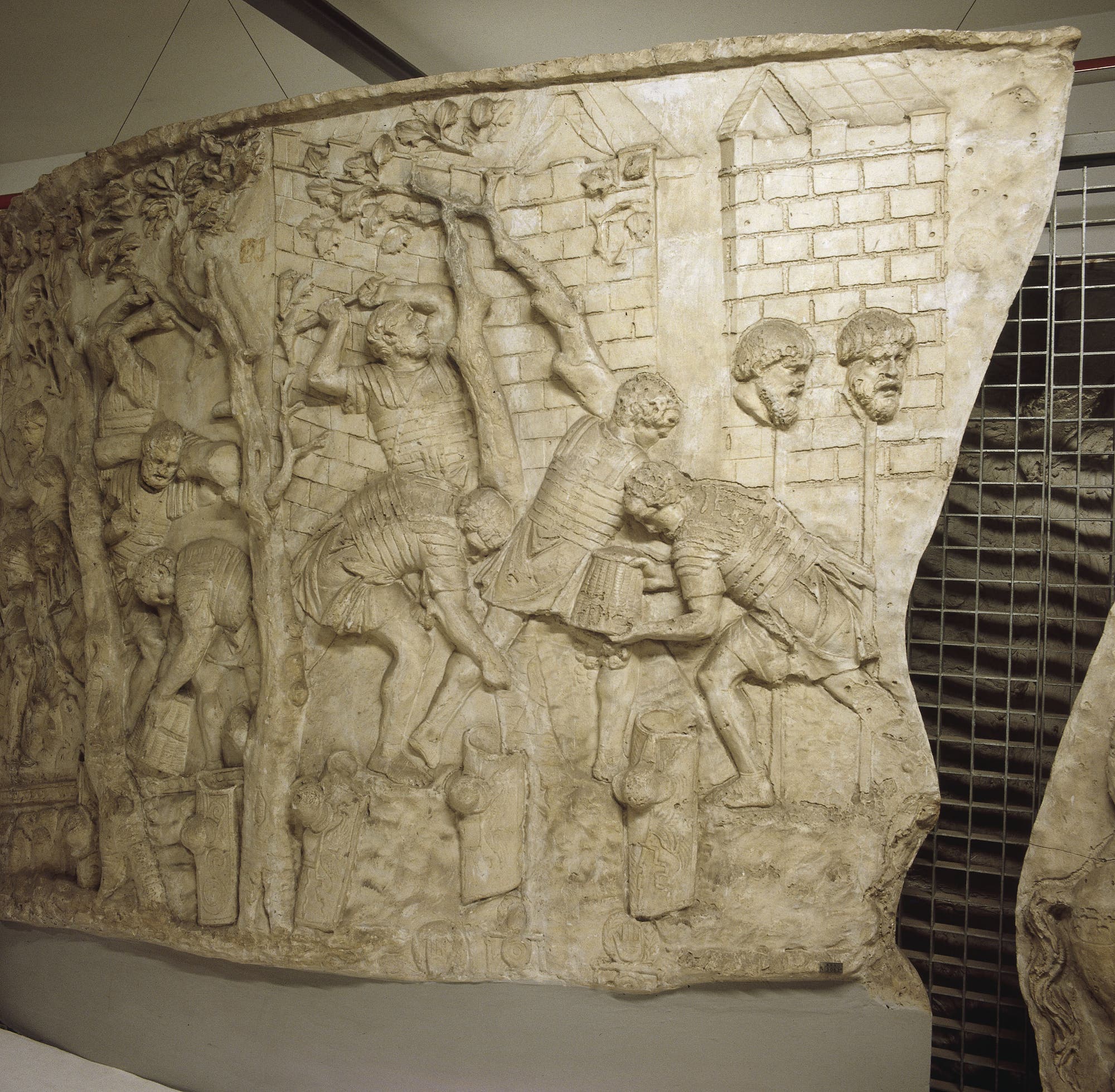 Legionäre beim Straßenbau, dargestellt auf einem Relief der Trajanssäule in Rom.