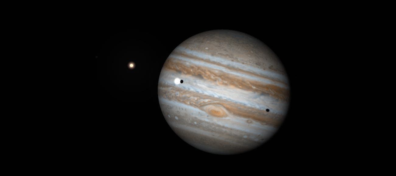 Die Schatten von Io und Ganymed gemeinsam auf der Jupiterscheibe