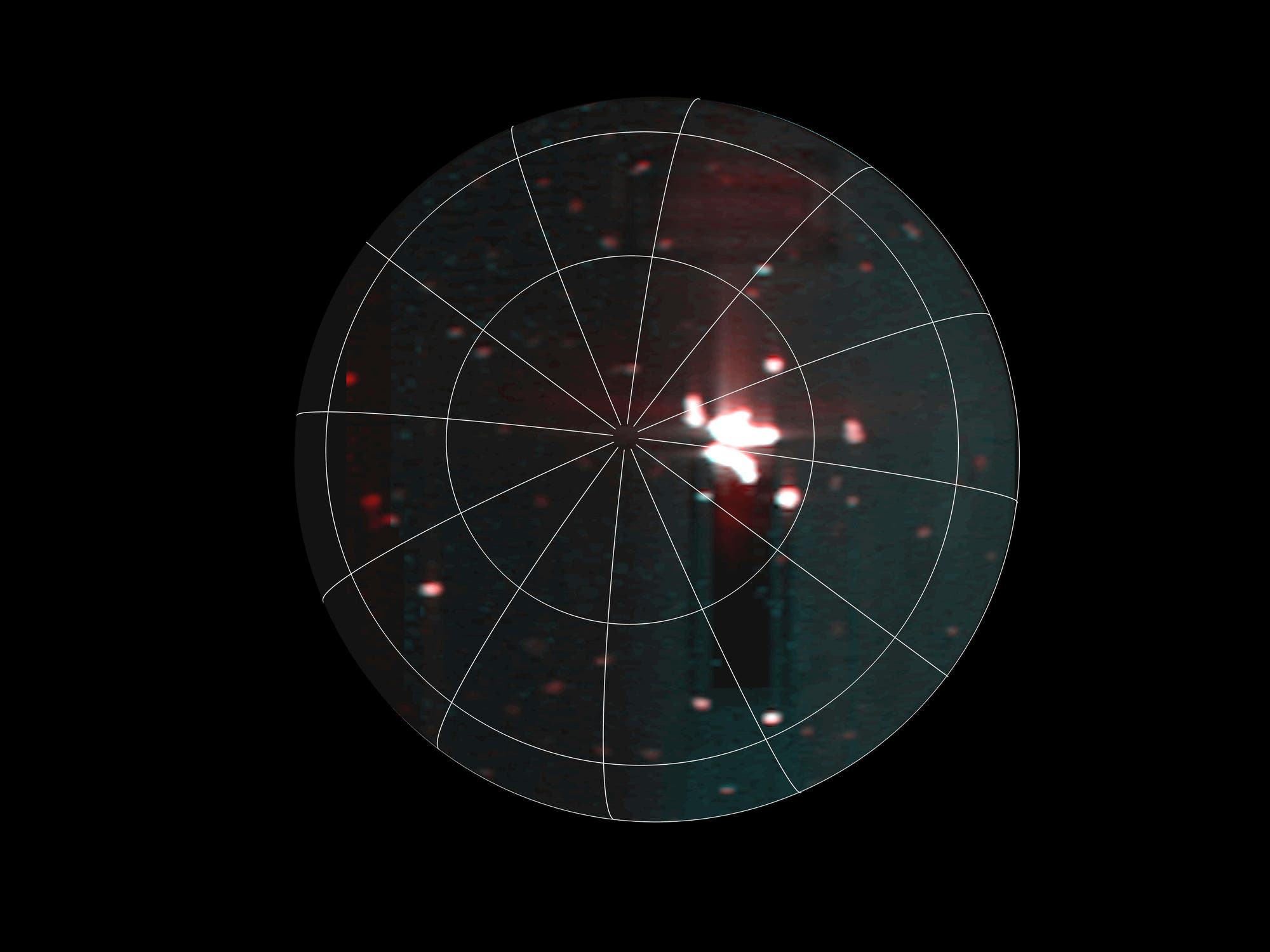 Una imagen oscura muestra un área ovalada con un motivo a la parrilla que recuerda a un telescopio o diagrama de radard. En el fondo puede ver puntos borrosos y un punto de luz central que recuerda las estrellas o galaxias. La imagen transmite un contexto científico o astronómico.