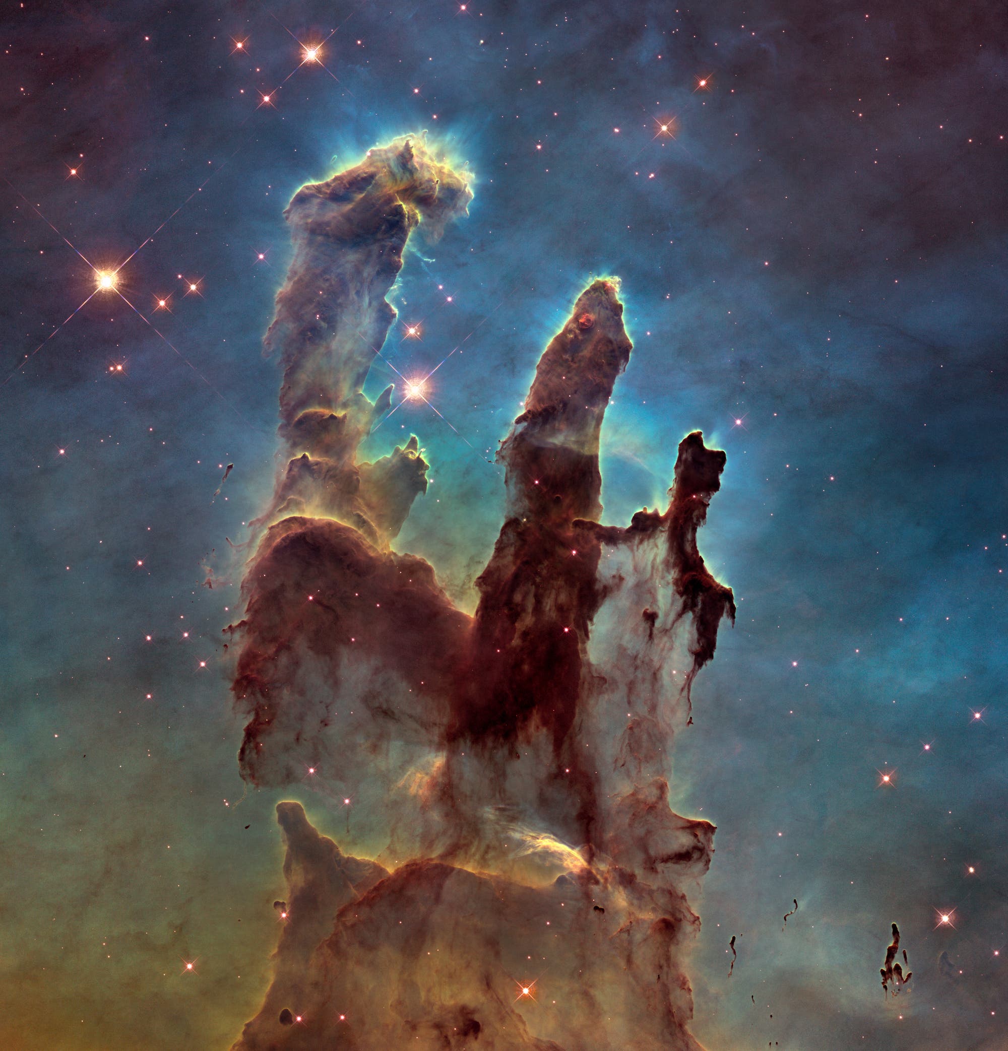 Die "Säulen der Schöpfung" im Adlernebel (Aufnahme des Weltraumteleskops Hubble)