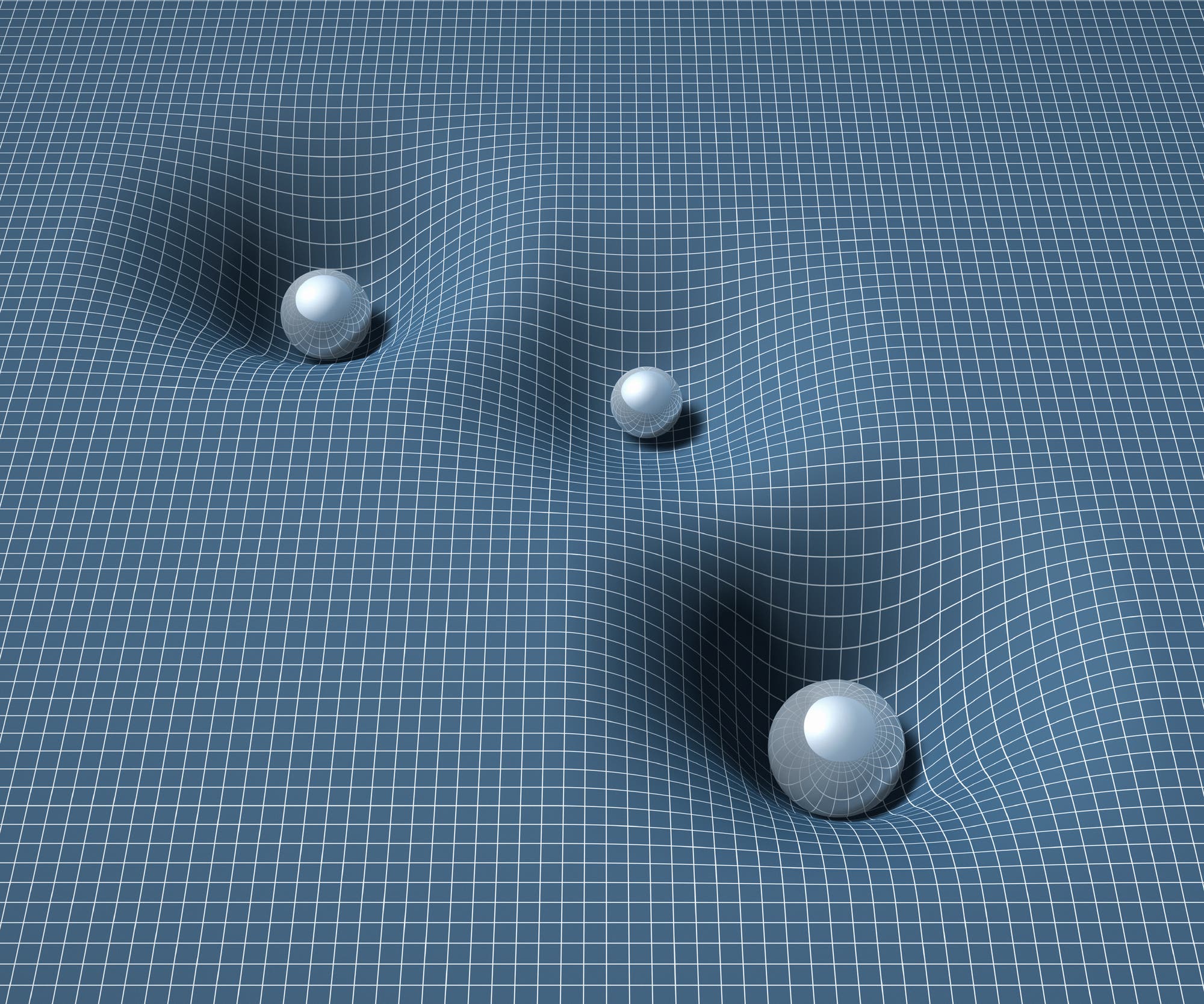 Eine dreidimensionale Darstellung eines Gitternetzes, das durch die Gravitation von drei unterschiedlich großen Kugeln verformt wird. Die Kugeln erzeugen Vertiefungen im Gitter, die die Krümmung des Raums durch Masse veranschaulichen. Die größte Kugel befindet sich rechts unten, die mittlere links und die kleinste in der Mitte. Dieses Bild veranschaulicht das Konzept der Raumzeitkrümmung in der Relativitätstheorie.