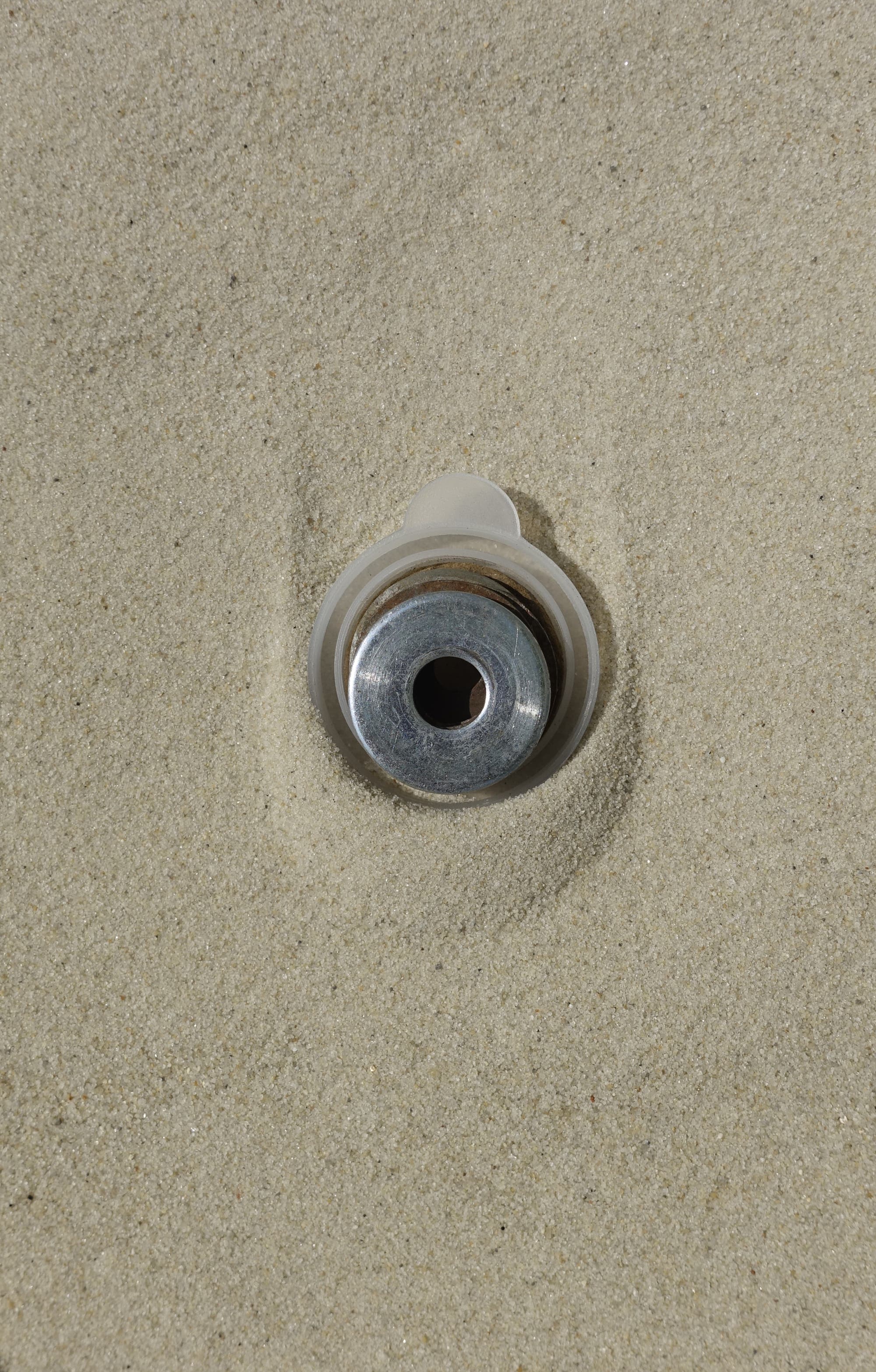 Geneig­te Sandfläche