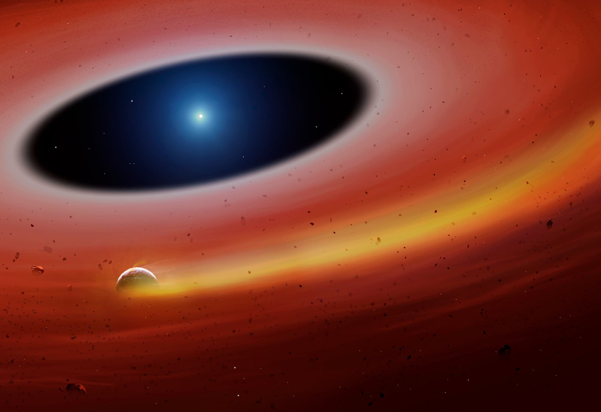 Ein Überrest eines zerstörten Planeten umrundet einen Weißen Zwerg (künstlerische Darstellung)