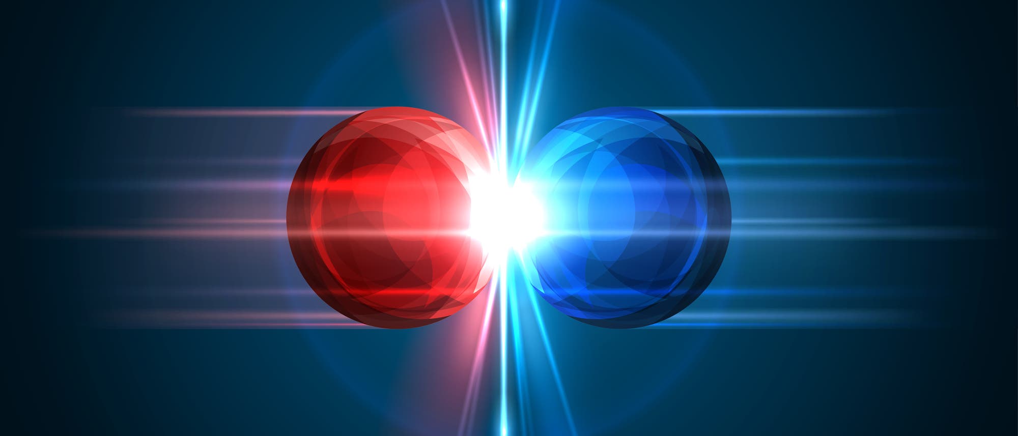 Eine rote und eine blaue Kugel treffen sich und am Kontaktpunkt gibt es einen Lichtblitz. Es soll eine Materie-Antimaterie-Kollision darstellen, tut das aber in wirklich jeder Hinsicht falsch. 