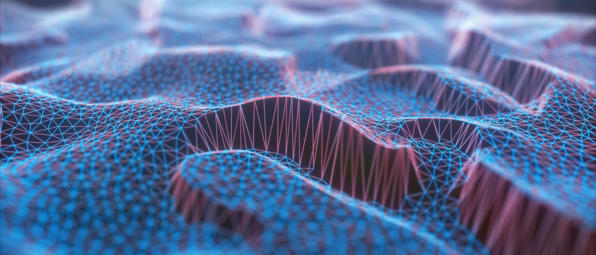Eine 3D-Darstellung zeigt eine wellenförmige Oberfläche, die mit einem Netz aus blauen und roten Linien überzogen ist. Die Linien bilden ein komplexes Gittermuster, das die topografischen Höhen und Tiefen der Oberfläche betont. Die Darstellung vermittelt ein Gefühl von Tiefe und Struktur, das für wissenschaftliche Visualisierungen typisch ist. Eine 3D-Darstellung zeigt eine wellenförmige Oberfläche, die mit einem Netz aus blauen und roten Linien überzogen ist. Die Linien bilden ein komplexes Gittermuster, das die topografischen Höhen und Tiefen der Oberfläche betont. Die Darstellung vermittelt ein Gefühl von Tiefe und Struktur, das für wissenschaftliche Visualisierungen typisch ist.