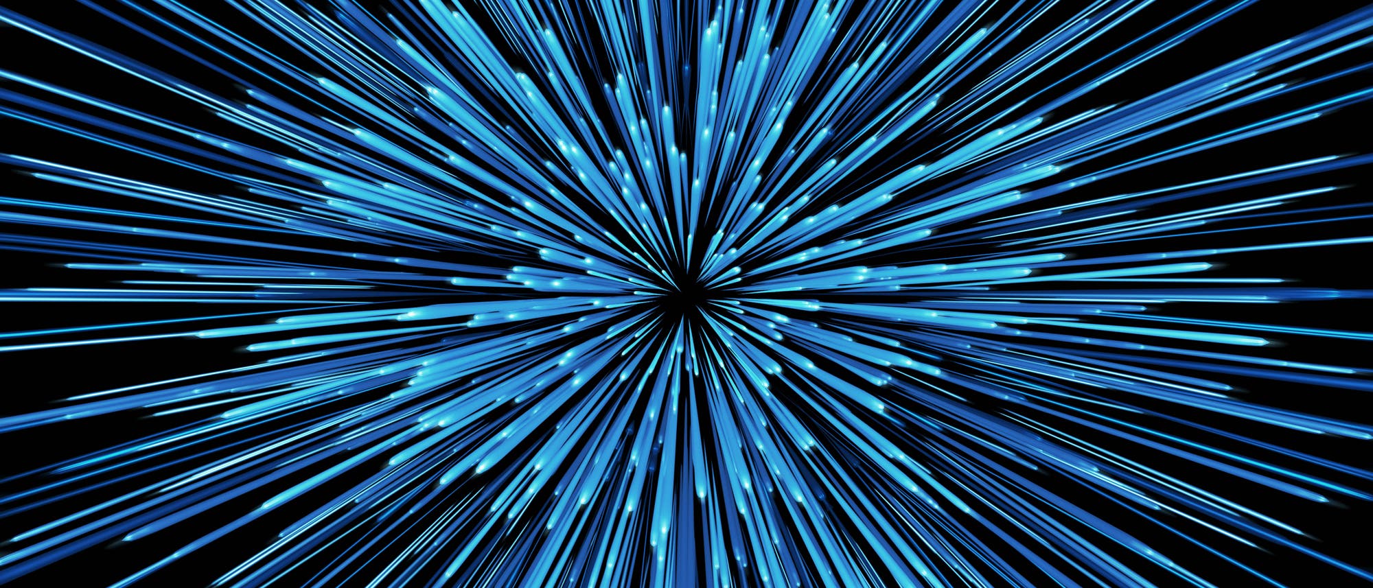 Ein strahlenförmiges Muster aus leuchtend blauen Linien, die von einem zentralen Punkt auf einem schwarzen Hintergrund in alle Richtungen ausgehen. Die Linien variieren in Länge und Helligkeit, was den Eindruck von Bewegung oder Geschwindigkeit vermittelt, ähnlich einem Sternenfeld in einem Sciencefiction-Film. Ein strahlenförmiges Muster aus leuchtend blauen Linien, die von einem zentralen Punkt auf einem schwarzen Hintergrund in alle Richtungen ausgehen. Die Linien variieren in Länge und Helligkeit, was den Eindruck von Bewegung oder Geschwindigkeit vermittelt, ähnlich einem Sternenfeld in einem Sciencefiction-Film.