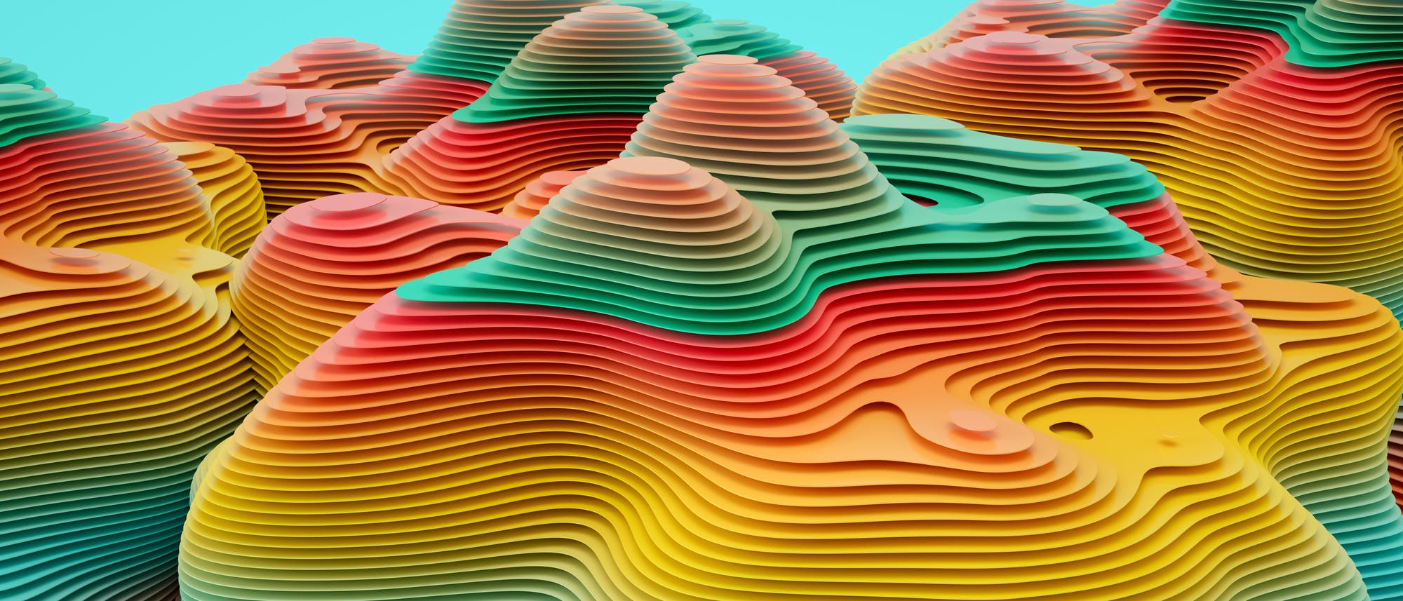 Ein abstraktes 3D-Bild zeigt eine Landschaft aus geschichteten, wellenförmigen Formen, die an bunte Hügel erinnern. Die Schichten sind in lebhaften Farben wie Rot, Orange, Gelb, Grün und Blau gehalten und erzeugen einen dynamischen, topografischen Effekt. Der Hintergrund ist ein helles Türkis, das einen starken Kontrast zu den intensiven Farben der Schichten bildet. Ein abstraktes 3D-Bild zeigt eine Landschaft aus geschichteten, wellenförmigen Formen, die an bunte Hügel erinnern. Die Schichten sind in lebhaften Farben wie Rot, Orange, Gelb, Grün und Blau gehalten und erzeugen einen dynamischen, topografischen Effekt. Der Hintergrund ist ein helles Türkis, das einen starken Kontrast zu den intensiven Farben der Schichten bildet.