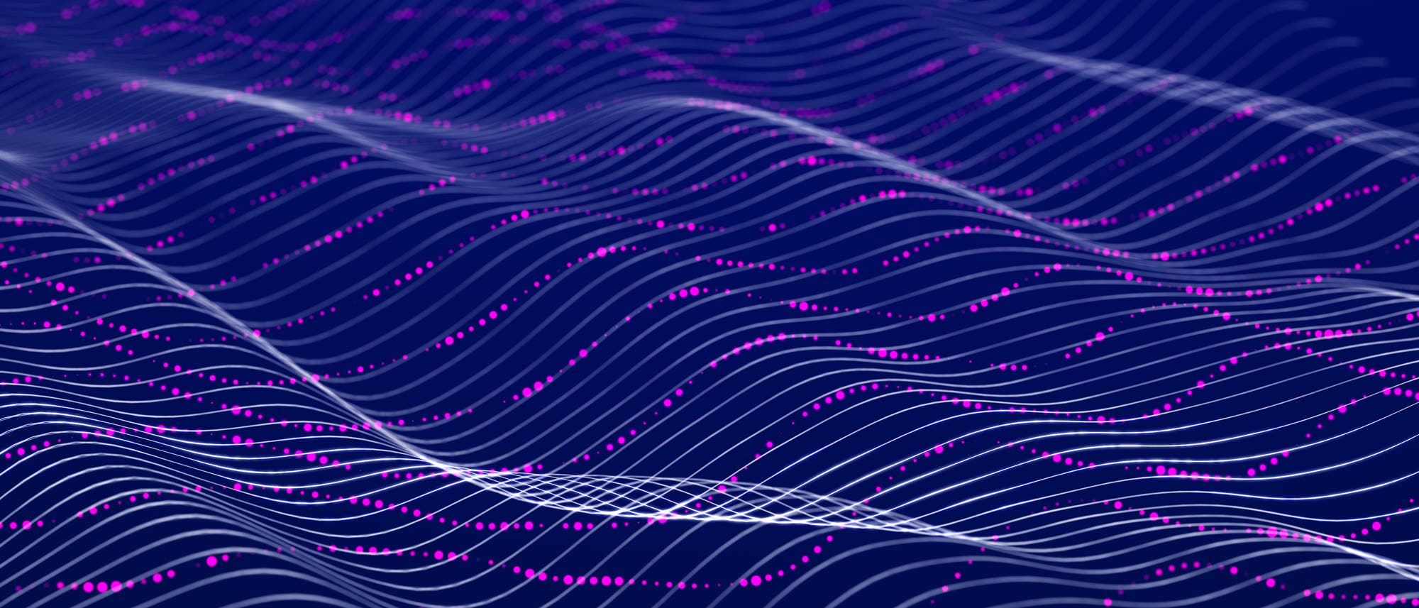 Eine 3D-Darstellung zeigt wellenförmige Linien, die sich über eine dunkle Fläche erstrecken. Die Linien sind mit kleinen, violetten Punkten besetzt, die entlang der Wellen verlaufen. Der Hintergrund ist dunkelblau, was den Kontrast zu den hellen Linien und Punkten verstärkt. Eine 3D-Darstellung zeigt wellenförmige Linien, die sich über eine dunkle Fläche erstrecken. Die Linien sind mit kleinen, violetten Punkten besetzt, die entlang der Wellen verlaufen. Der Hintergrund ist dunkelblau, was den Kontrast zu den hellen Linien und Punkten verstärkt.