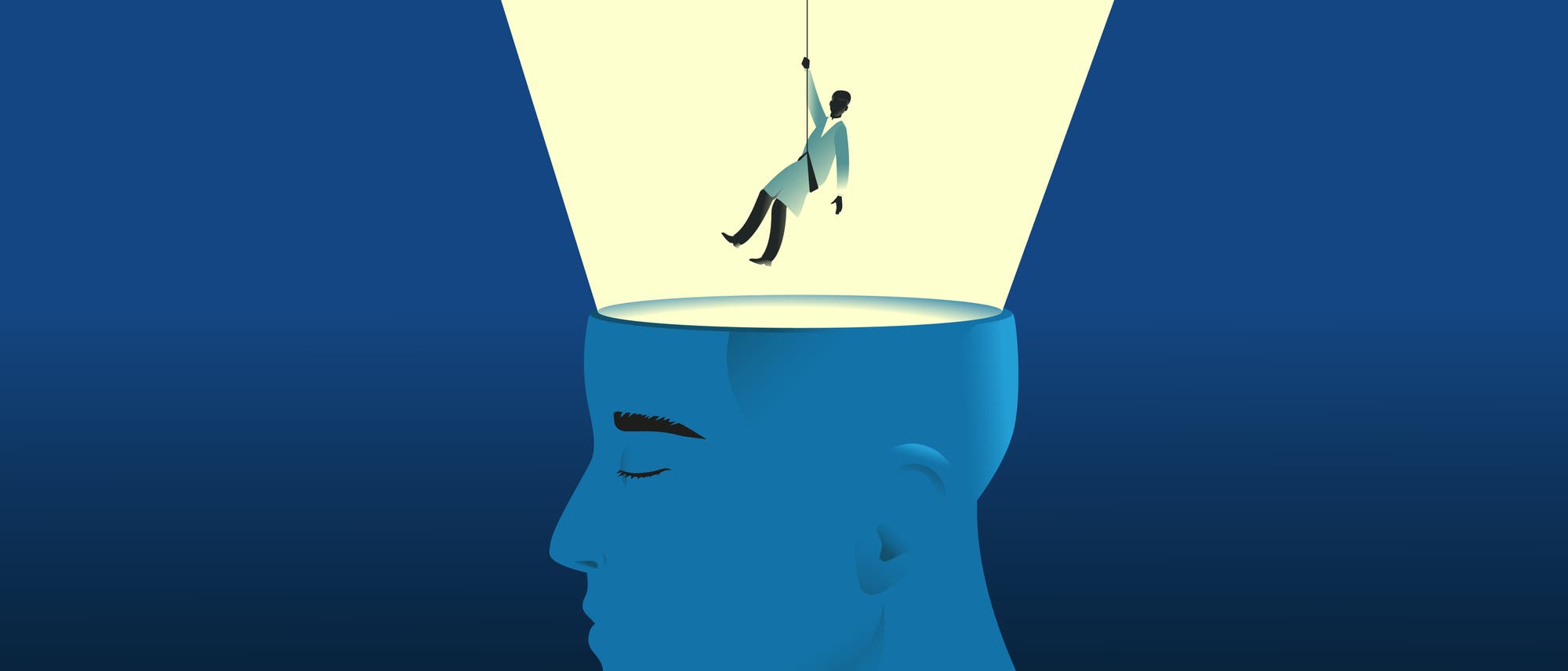 Eine künstlerische Illustration zeigt einen blauen Kopf im Profil mit geschlossenen Augen. Der obere Teil des Kopfes ist geöffnet, und eine Person in einem weißen Kittel wird an einem Seil in den Kopf herabgelassen. Ein heller Lichtstrahl beleuchtet die Szene, was auf das Eindringen von Wissen oder Ideen hindeutet. Der Hintergrund ist dunkelblau, was den Kontrast zur beleuchteten Szene verstärkt. Eine künstlerische Illustration zeigt einen blauen Kopf im Profil mit geschlossenen Augen. Der obere Teil des Kopfes ist geöffnet, und eine Person in einem weißen Kittel wird an einem Seil in den Kopf herabgelassen. Ein heller Lichtstrahl beleuchtet die Szene, was auf das Eindringen von Wissen oder Ideen hindeutet. Der Hintergrund ist dunkelblau, was den Kontrast zur beleuchteten Szene verstärkt.