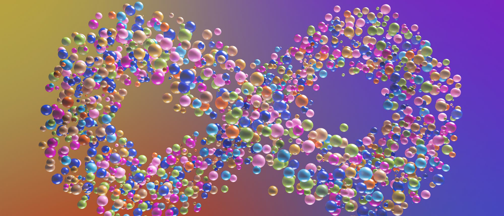Eine 3D-Darstellung zeigt eine große Anzahl bunter Kugeln, die in der Form eines Unendlichkeitszeichens angeordnet sind. Die Kugeln variieren in Größe und Farbe, darunter Blau, Grün, Pink und Gelb. Der Hintergrund ist ein sanfter Farbverlauf von Gelb zu Violett, was der Darstellung Tiefe und Dynamik verleiht. Eine 3D-Darstellung zeigt eine große Anzahl bunter Kugeln, die in der Form eines Unendlichkeitszeichens angeordnet sind. Die Kugeln variieren in Größe und Farbe, darunter Blau, Grün, Pink und Gelb. Der Hintergrund ist ein sanfter Farbverlauf von Gelb zu Violett, was der Darstellung Tiefe und Dynamik verleiht.