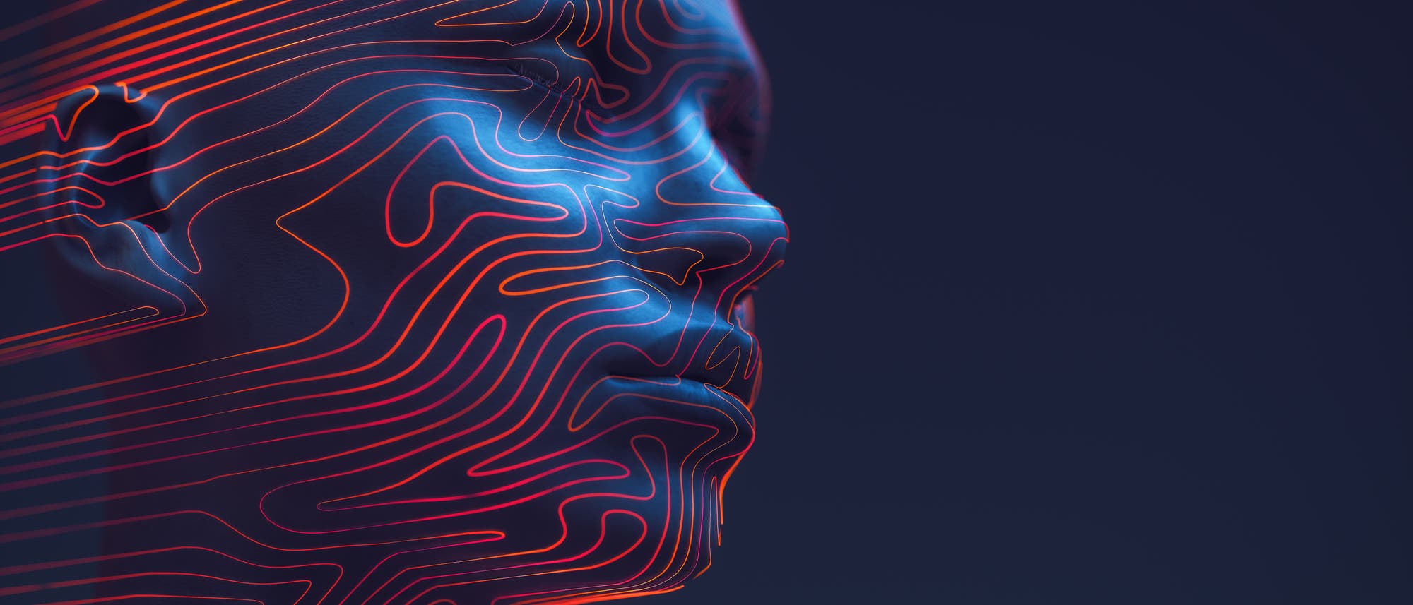 Eine 3D-Darstellung eines menschlichen Gesichts, das von leuchtenden, geschwungenen Linien in Rot- und Blautönen überzogen ist. Die Linien folgen den Konturen des Gesichts und erzeugen ein futuristisches, technisches Erscheinungsbild. Der Hintergrund ist dunkel, was die leuchtenden Linien hervorhebt. Eine 3D-Darstellung eines menschlichen Gesichts, das von leuchtenden, geschwungenen Linien in Rot- und Blautönen überzogen ist. Die Linien folgen den Konturen des Gesichts und erzeugen ein futuristisches, technisches Erscheinungsbild. Der Hintergrund ist dunkel, was die leuchtenden Linien hervorhebt.