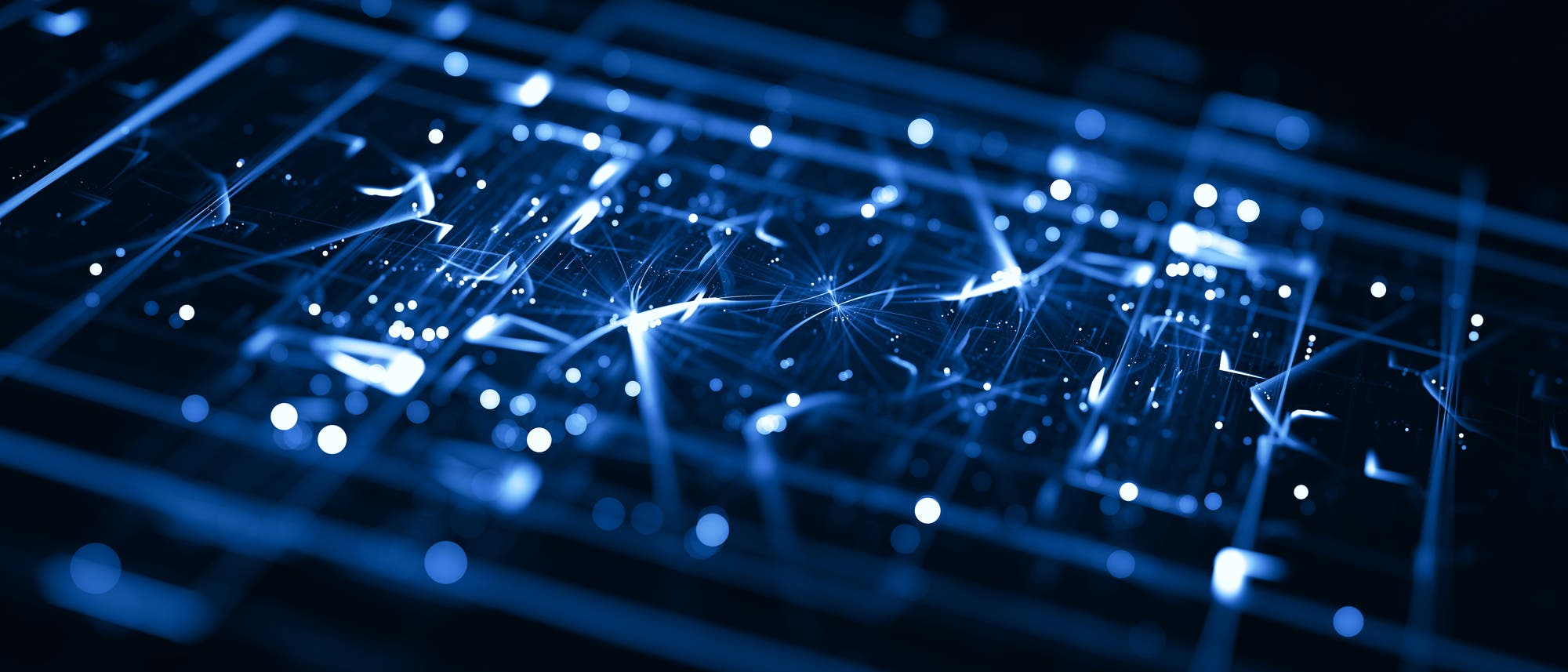 Ein abstraktes Schaltkreis-Diagramm in Blautönen, das komplexe Verbindungen und leuchtende Knotenpunkte zeigt. Die Linien und Punkte symbolisieren elektronische Verbindungen und Datenflüsse, die in einem Netzwerk oder Computerchip vorkommen könnten. Die Darstellung vermittelt ein Gefühl von Technologie und digitaler Vernetzung. Ein abstraktes Schaltkreis-Diagramm in Blautönen, das komplexe Verbindungen und leuchtende Knotenpunkte zeigt. Die Linien und Punkte symbolisieren elektronische Verbindungen und Datenflüsse, die in einem Netzwerk oder Computerchip vorkommen könnten. Die Darstellung vermittelt ein Gefühl von Technologie und digitaler Vernetzung.