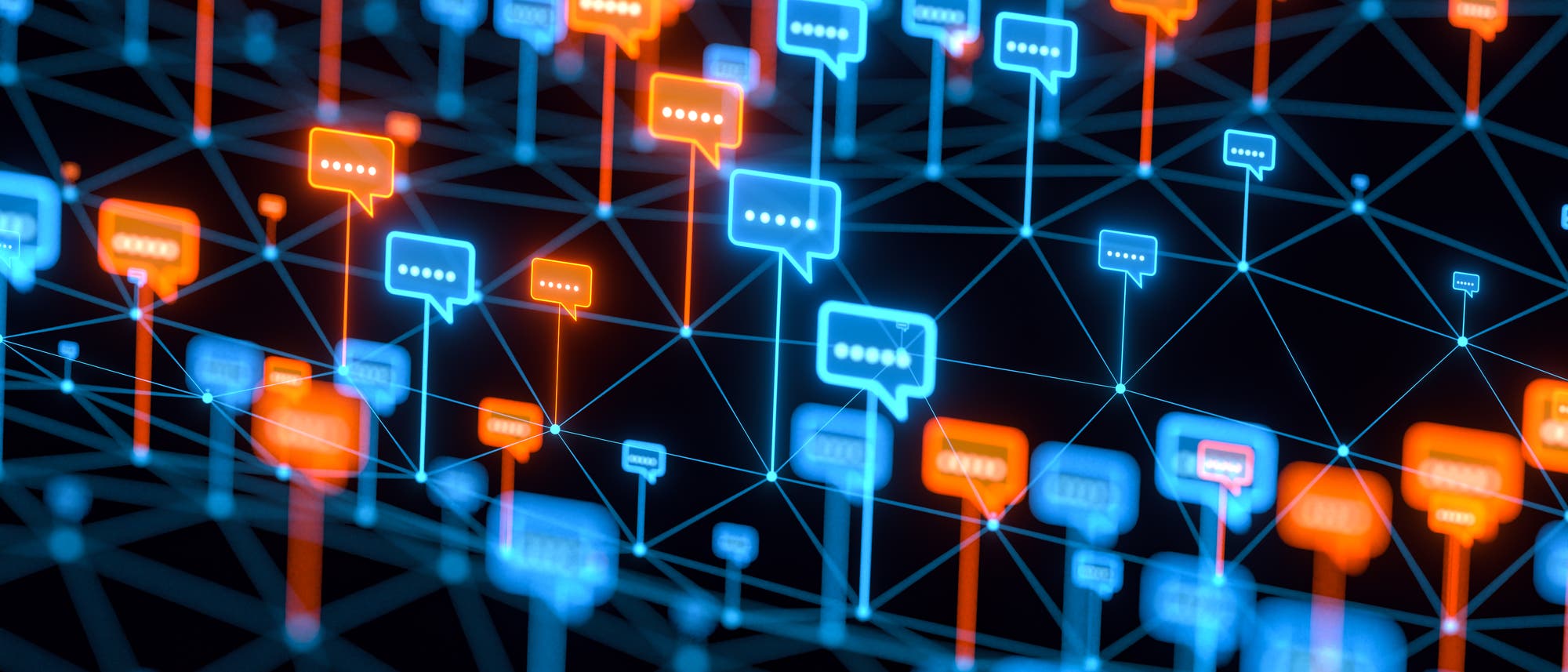 Ein digitales Netzwerk aus leuchtenden Sprechblasen in Blau und Orange, die durch Linien verbunden sind. Die Sprechblasen symbolisieren Kommunikation und Datenfluss in einem komplexen System. Der Hintergrund ist dunkel, wodurch die Farben der Sprechblasen hervorgehoben werden.