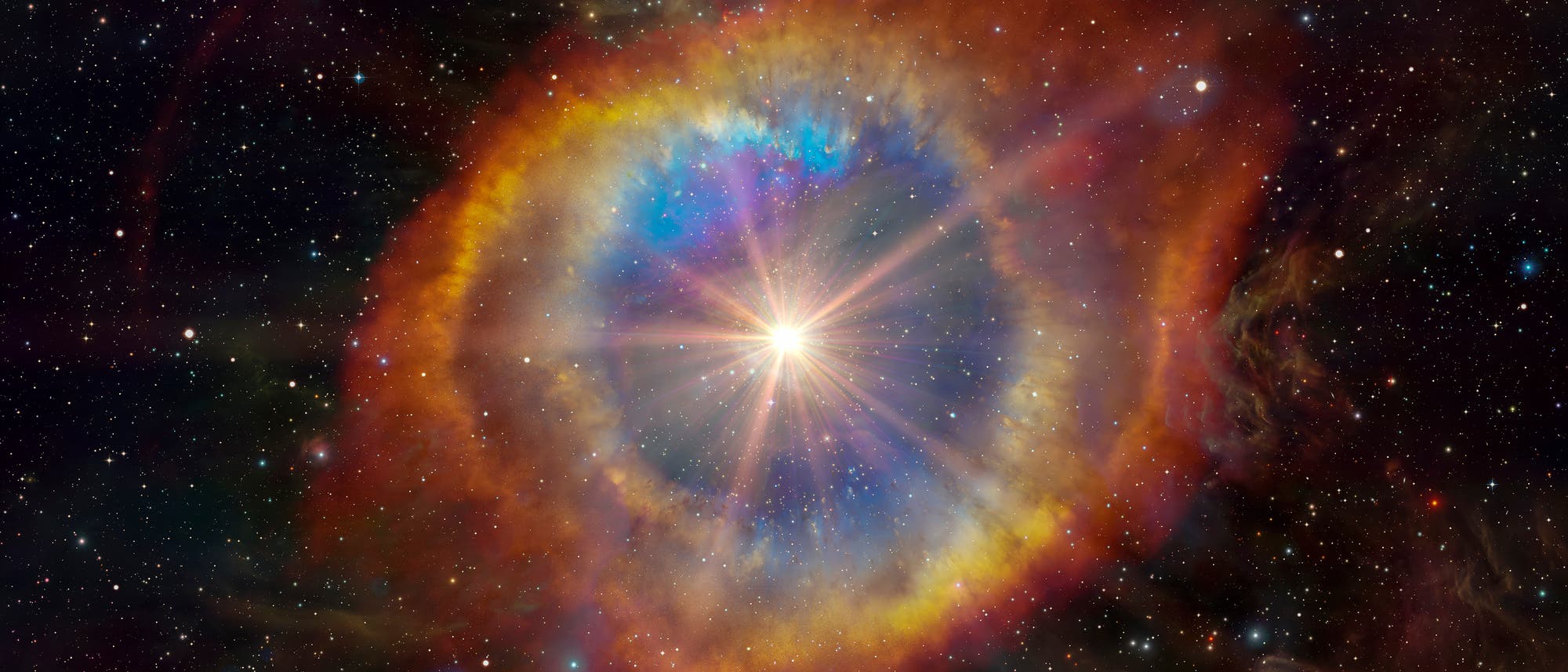 Ein farbenfrohes astronomisches Bild zeigt einen leuchtenden Stern im Zentrum, umgeben von einem strahlenden, mehrfarbigen Nebel. Der Nebel bildet einen kreisf&ouml;rmigen Halo mit Schattierungen von Blau, Rot und Gelb. Im Hintergrund ist ein dichter Sternenhimmel zu sehen, der die Weite des Universums darstellt. Das Bild vermittelt die Sch&ouml;nheit und Komplexit&auml;t kosmischer Ph&auml;nomene. Schl&uuml;sselw&ouml;rter: Astronomie, Stern, Nebel, Universum, Kosmos.
