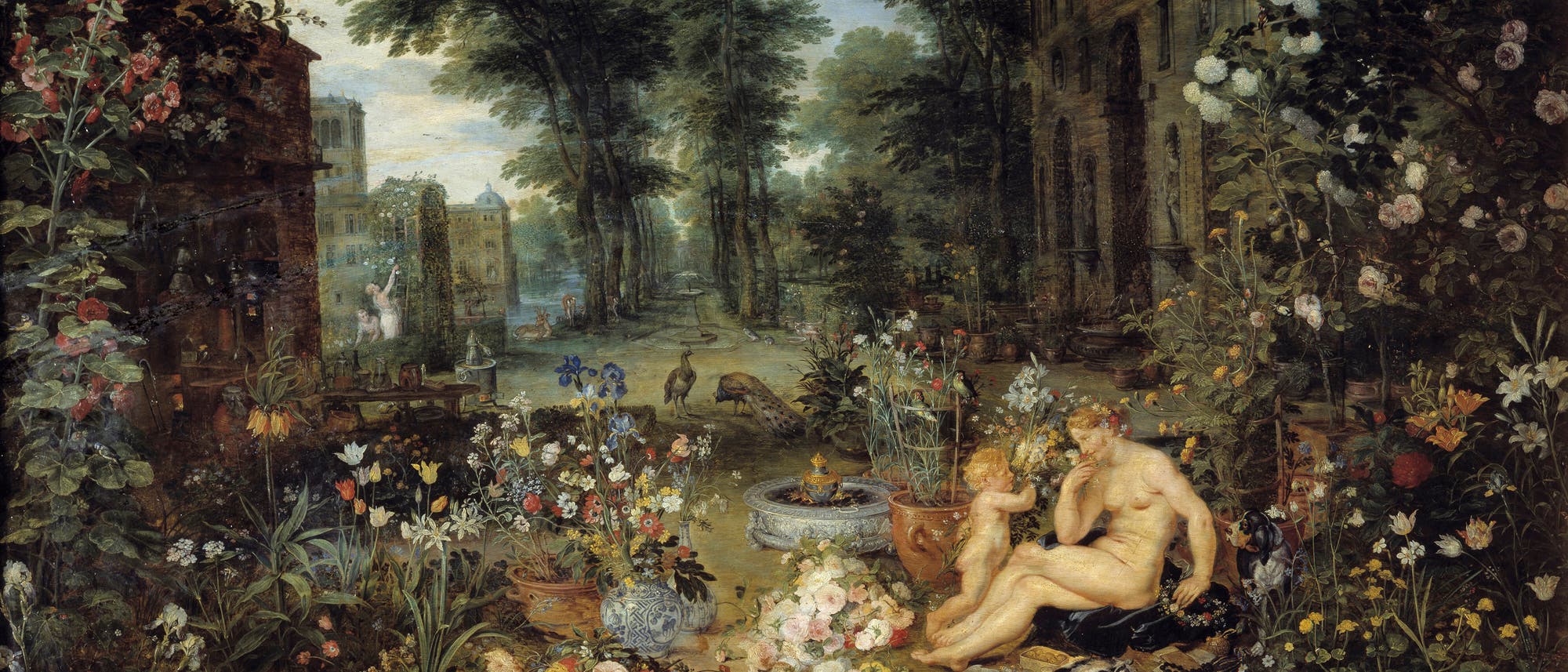 Ein kunstvolles Gem&auml;lde zeigt eine idyllische Gartenszene mit &uuml;ppiger Vegetation und Blumen in verschiedenen Farben. Im Vordergrund sitzt eine nackte Frau neben einem Kind, umgeben von Blumenarrangements und dekorativen Vasen. Im Hintergrund erstreckt sich ein weitl&auml;ufiger Garten mit hohen B&auml;umen und einem Geb&auml;ude. Pfauen und andere V&ouml;gel sind im Garten zu sehen, was eine friedliche und harmonische Atmosph&auml;re schafft. Das Bild vermittelt eine klassische, romantische Darstellung der Natur und menschlicher Figuren.