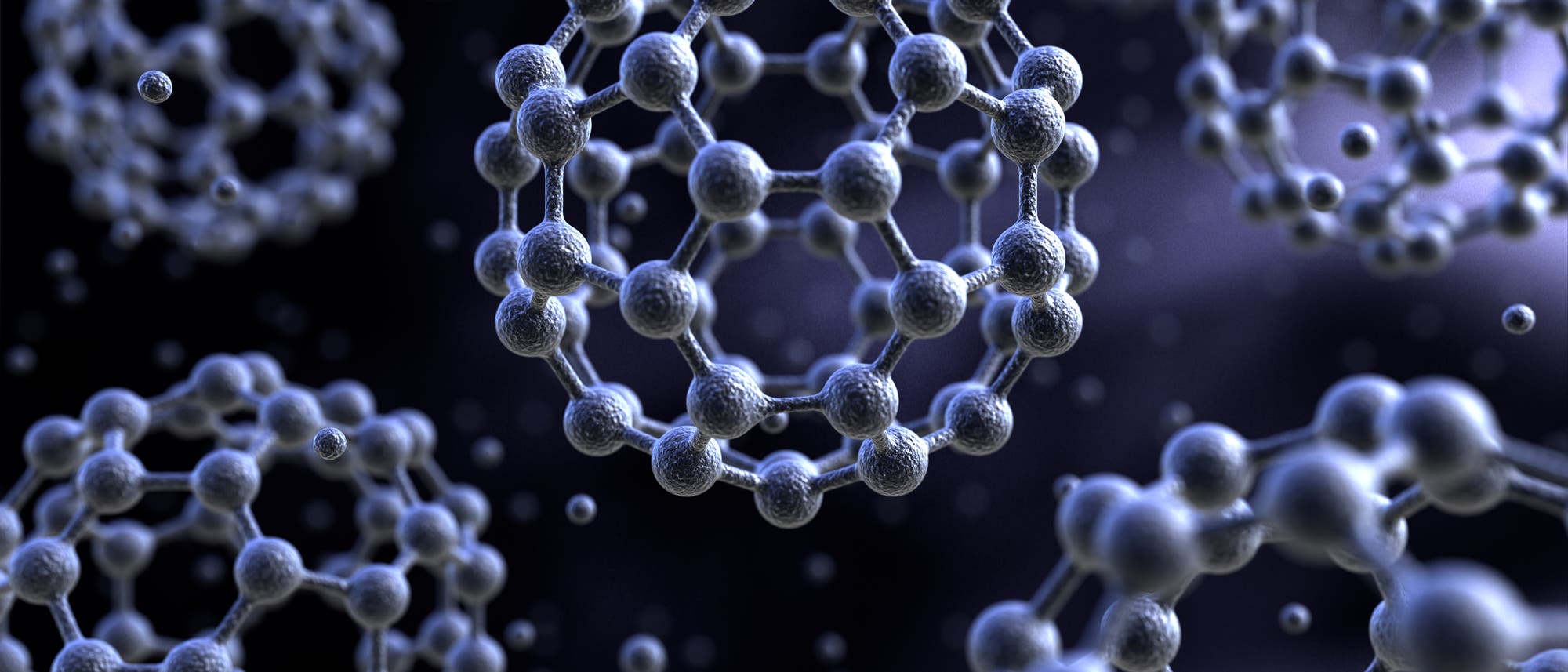 3D-Darstellung mehrerer kugelförmiger Strukturen, die aus miteinander verbundenen Knoten bestehen und an ein Netzwerk aus Ringen erinnern. Die Strukturen schweben in einem dunklen, unscharfen Hintergrund, was einen räumlichen Effekt erzeugt. Die Darstellung betont die geometrische Anordnung und die Verbindungspunkte der Knoten. 3D-Darstellung mehrerer kugelförmiger Strukturen, die aus miteinander verbundenen Knoten bestehen und an ein Netzwerk aus Ringen erinnern. Die Strukturen schweben in einem dunklen, unscharfen Hintergrund, was einen räumlichen Effekt erzeugt. Die Darstellung betont die geometrische Anordnung und die Verbindungspunkte der Knoten.