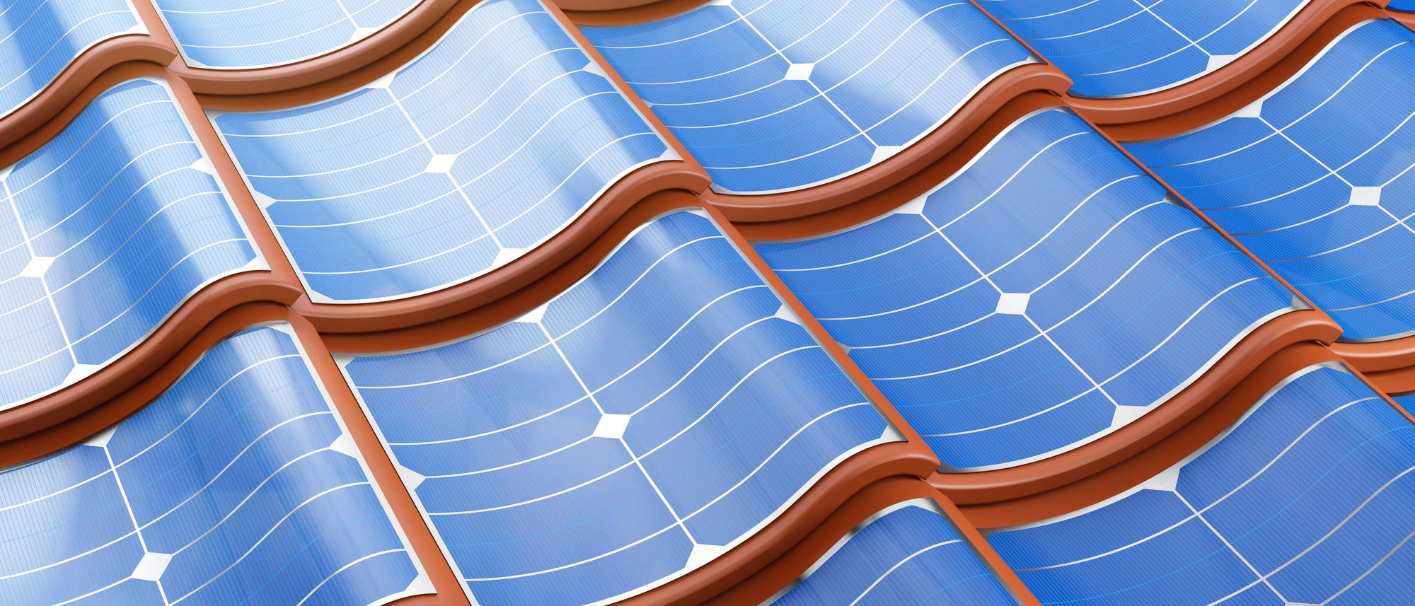 Auf gewellten Dachziegeln sind flexible Solarzellen aufgeklebt