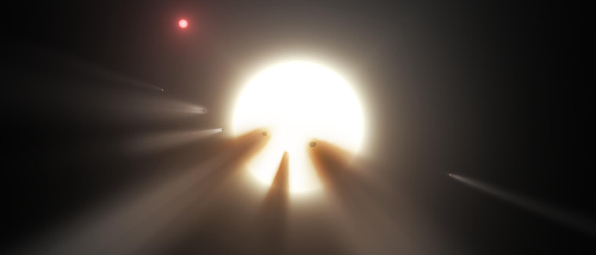 Der Stern KIC 8462852 gibt den Forschern Rätsel auf: Worin könnte die Ursache der unregelmäßigen Verfinsterungen liegen? Kometen oder planetare Kleinkörper, wie in dieser künstlerischen Darstellung, bieten jedenfalls keine plausible Erklärung.