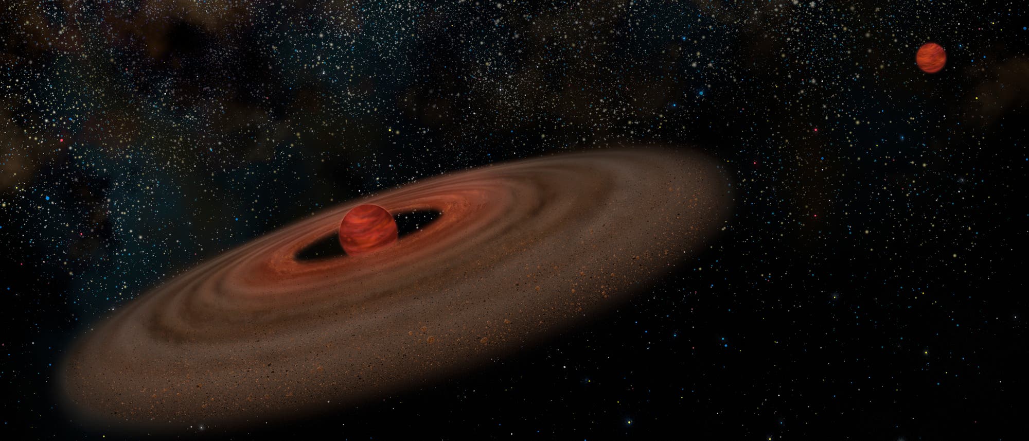 Illustration eines astronomischen Szenarios mit einem braunen Zwerg im Zentrum, umgeben von einer rotierenden Staubscheibe. Im Hintergrund ist ein Sternenfeld zu sehen, das den Weltraum darstellt. Ein weiterer kleinerer Himmelsk&ouml;rper befindet sich rechts im Bild. Die Szene vermittelt den Eindruck von kosmischer Weite und der Dynamik von Himmelsk&ouml;rpern.