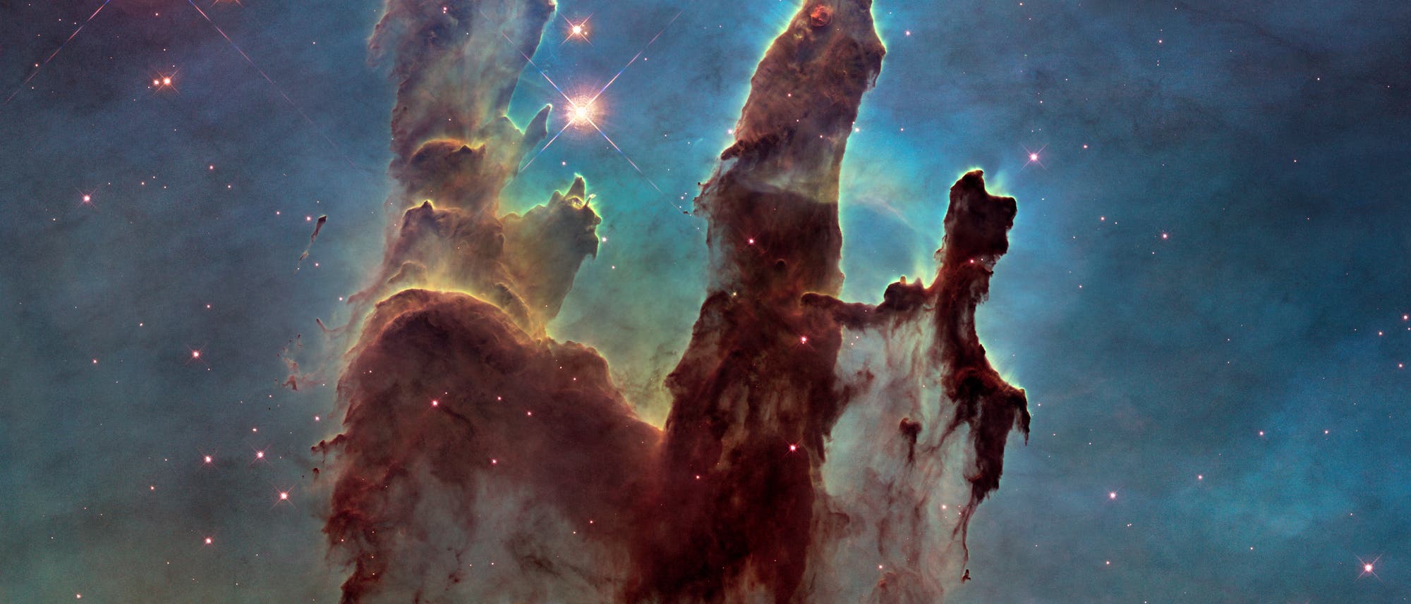 Die "Säulen der Schöpfung" im Adlernebel (Aufnahme des Weltraumteleskops Hubble)