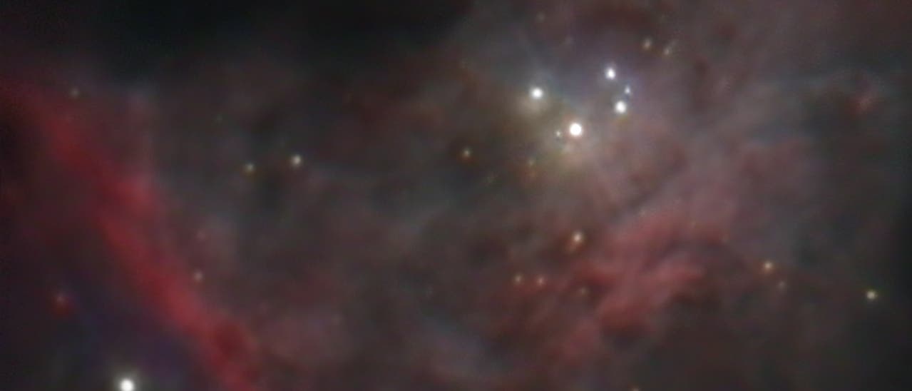 Ein Bild des Orionnebels, einer leuchtenden Wolke aus Gas und Staub im Weltraum. Der Nebel zeigt helle Sterne, die von rötlichen und violetten Gaswolken umgeben sind. Die Sterne strahlen intensiv und sind von dunkleren Bereichen umgeben, die die Tiefe des Weltraums andeuten. Der Orionnebel ist ein bekanntes Sternentstehungsgebiet und ein beliebtes Ziel für Astronomie-Enthusiasten.