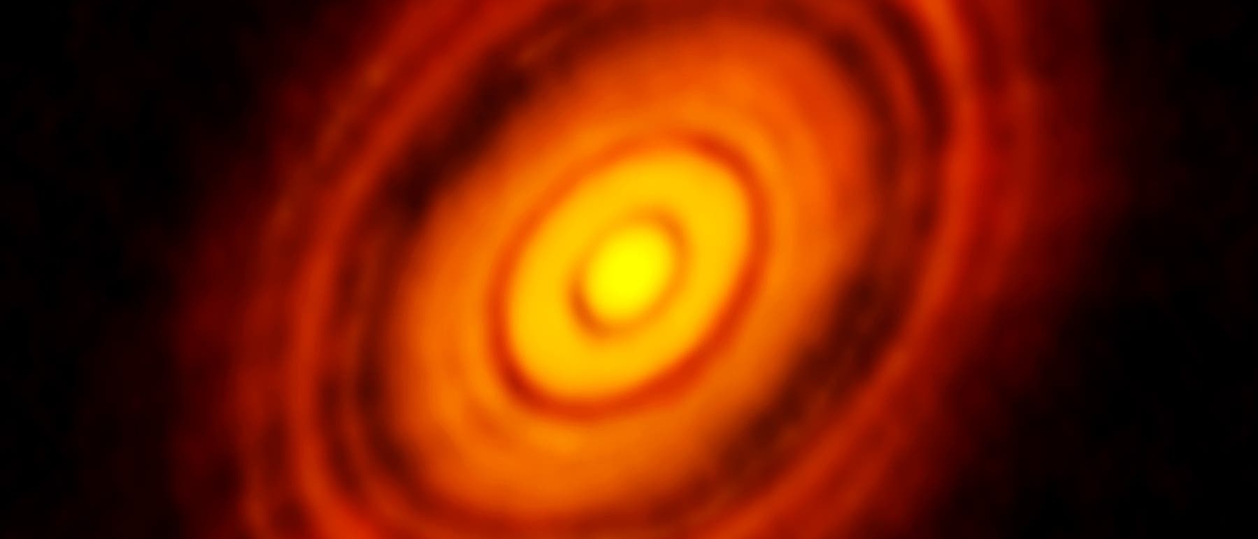 Junger Stern HL Tauri mit seiner protoplanetaren Scheibe