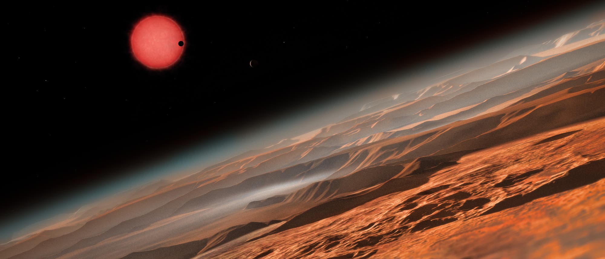 Künstlerische Darstellung des sehr kühlen Zwergsterns TRAPPIST-1 aus der Nähe eines seiner Planeten.