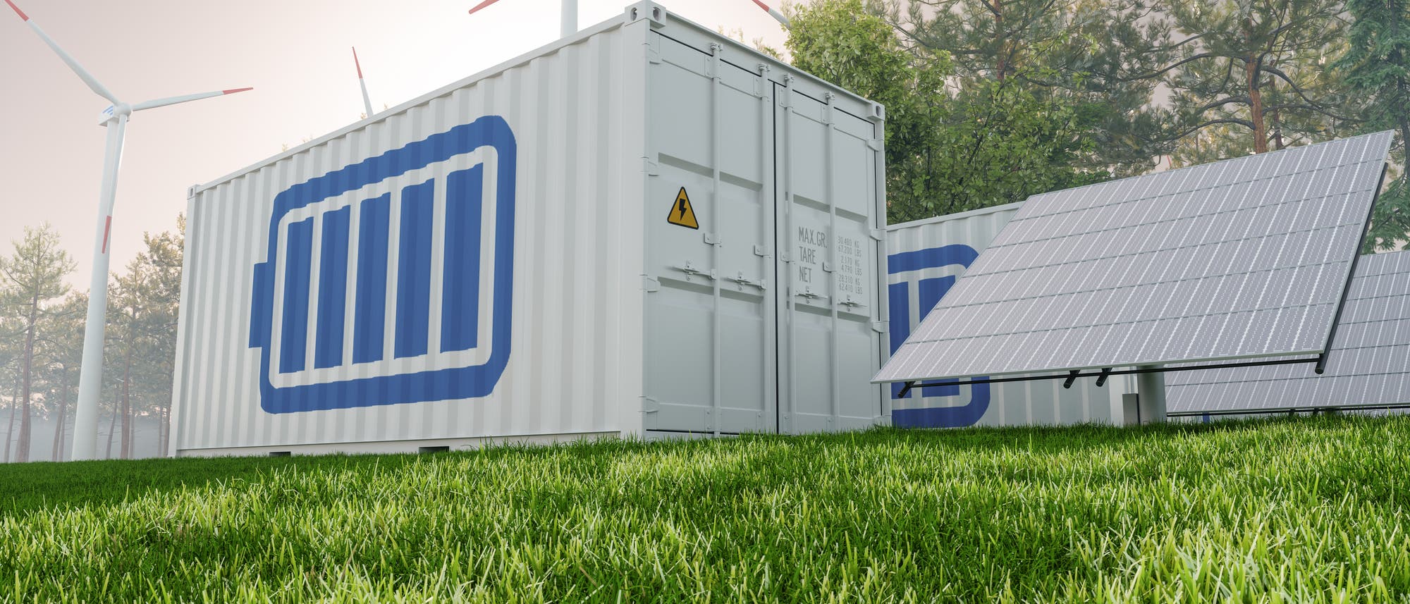 Symbolbild Batteriecontainer, rechts vorne Solarzelle, links hinten Windkraft.