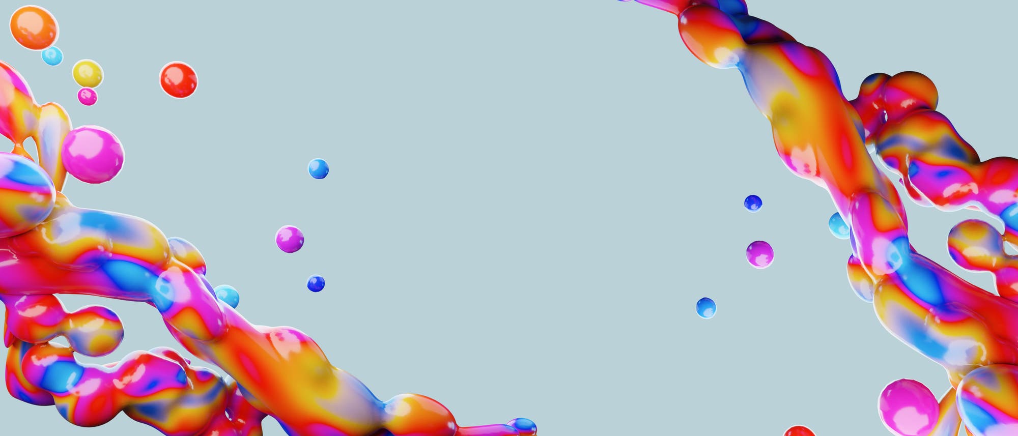 Eine Flüssgkeit schimmert in Regenbogenfarben (Symbolbild).