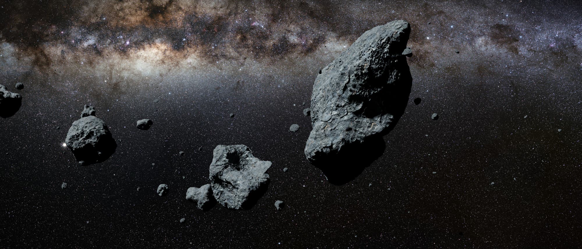 Die Illustration zeigt einen Asteroiden-Schwarm im All.