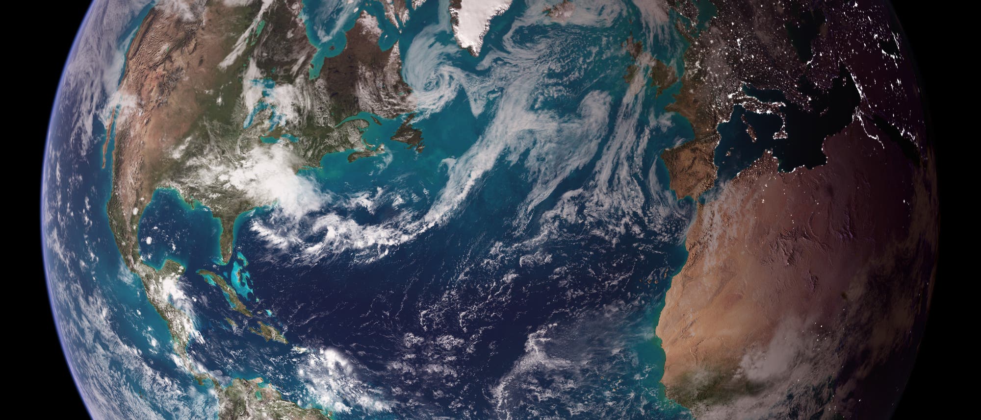 Satellitenbild der Erde, das den Atlantik in tiefem Blau zwischen den Kontinenten Nord- und Südamerika sowie Afrika und Europa zeigt