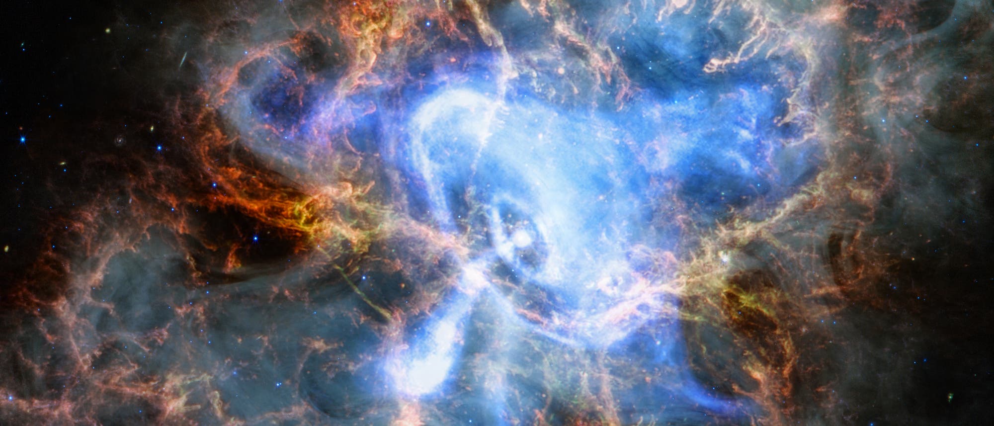 Ein farbenprächtiges astronomisches Bild zeigt den Krebsnebel, eine Supernova-Überrestwolke im Weltraum. Die Aufnahme zeigt leuchtende Gas- und Staubwolken in Blau-, Rot- und Orangetönen, die sich in komplexen Mustern ausbreiten. Im Zentrum befindet sich ein heller, pulsierender Neutronenstern, der als Pulsar bekannt ist. Der Hintergrund ist mit zahlreichen kleinen Sternen übersät. Dieses Bild veranschaulicht die dynamischen Prozesse und die Schönheit kosmischer Strukturen. Ein farbenprächtiges astronomisches Bild zeigt den Krebsnebel, eine Supernova-Überrestwolke im Weltraum. Die Aufnahme zeigt leuchtende Gas- und Staubwolken in Blau-, Rot- und Orangetönen, die sich in komplexen Mustern ausbreiten. Im Zentrum befindet sich ein heller, pulsierender Neutronenstern, der als Pulsar bekannt ist. Der Hintergrund ist mit zahlreichen kleinen Sternen übersät. Dieses Bild veranschaulicht die dynamischen Prozesse und die Schönheit kosmischer Strukturen.