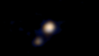 Das erste Farbbild von Pluto und Charon (New Horizons)