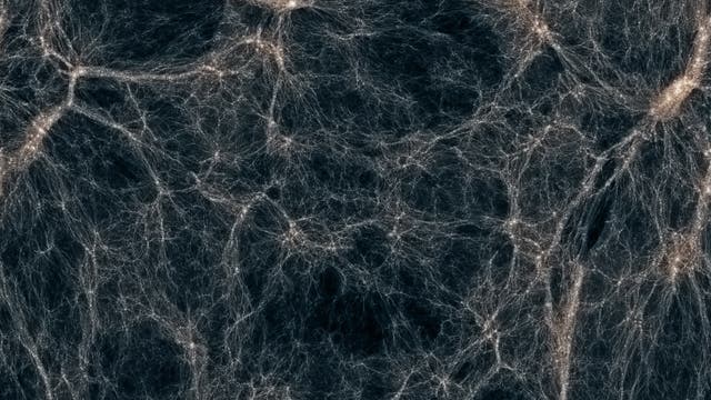 Darstellung des kosmischen Netzwerks im Universum. Die Abbildung zeigt ein komplexes Geflecht aus leuchtenden Filamenten und Knotenpunkten, die Galaxien und Materieansammlungen repräsentieren. Dunkle Bereiche dazwischen symbolisieren leeren Raum. Diese Struktur veranschaulicht die großräumige Verteilung von Materie im Kosmos.