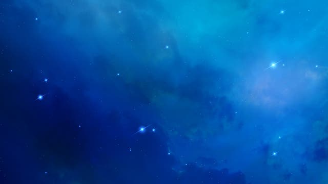 Blaunebliger Sternenhintergrund aus dem einige Sterne hell herausleuchten.