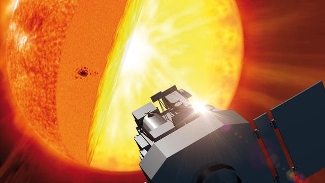 Der Sonnensatellit SOHO vor der Sonne (künstlerische Darstellung)