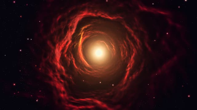 Ein leuchtender, spiralförmiger Nebel in Rot- und Orangetönen, der sich um einen hellen, zentralen Lichtpunkt im Weltraum windet. Umgeben von einem dunklen Hintergrund mit verstreuten, funkelnden Sternen. Keine Menschen oder Text im Bild.
