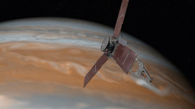 Raumsonde Juno vor Jupiter (künstlerische Darstellung)