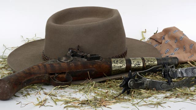 Pistole und Cowboyhut