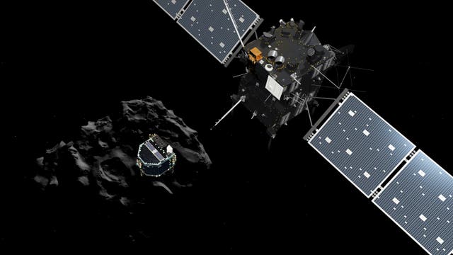 Künstlerische Darstellung von Rosetta vor dem Kometen 67P/Churyumov-Gerasimenko