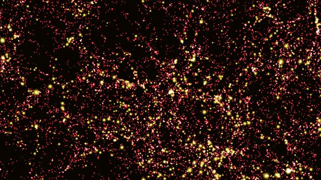 Eine Simulation zeigt die Verteilung der Dunklen Materie im frühen Universum. Große Anhäufungen Dunkler Materie sind rot dargestellt, Konzentrationen mit mehr als 300 Millionen Sonnenmassen gelb.
