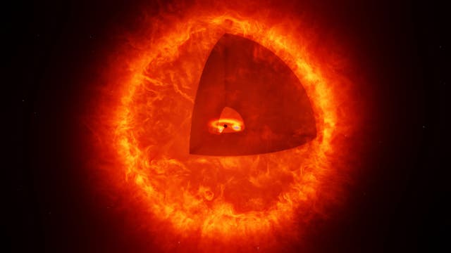 Eine künstlerische Darstellung eines Schwarzloch-Sterns mit einem ausgeschnittenen Segment, das das Innere zeigt. Im Zentrum des Sterns befindet sich eine schematische Darstellung eines Schwarzen Lochs, umgeben von einem leuchtenden Akkretionsring. Die äußere Hülle des Sterns ist in intensiven Rottönen dargestellt, die die Hitze und Energie des Sterns symbolisieren. 